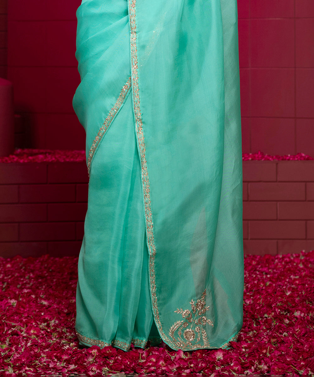 Handloom_Aqua_Blue_Organza_Saree_with_Embroidered_Motifs_And_Sea_Green_Raw_Silk_Blouse_WeaverStory_05