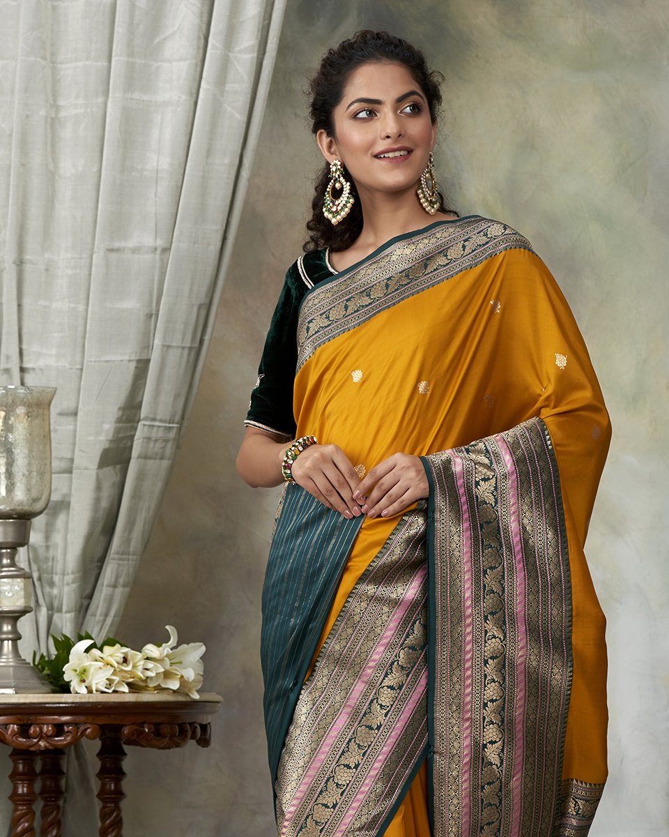 Mustard_Handloom_Pure_Katan_Silk_Saree_With_Green_Broad_Border_WeaverStory_01