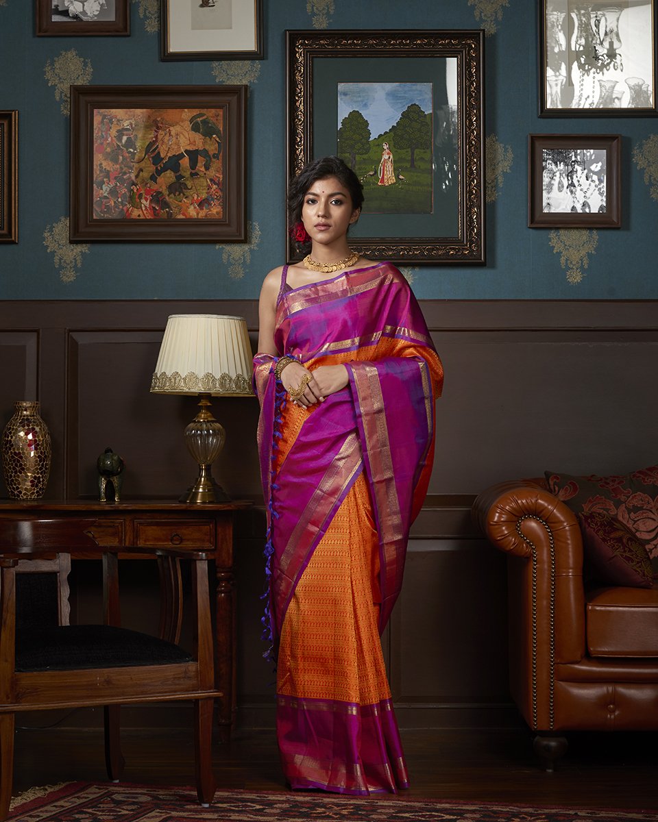 Orange_and_Purple_Handloom_Kanjivaram_Silk_Saree_with_Gold_Zari_Border_WeaverStory_02