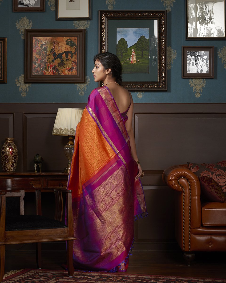 Orange_and_Purple_Handloom_Kanjivaram_Silk_Saree_with_Gold_Zari_Border_WeaverStory_03