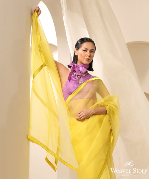 Yellow_Organza_Saree_With_Contrast_Lavender_Tie-up_Silk_Blouse_WeaverStory_01