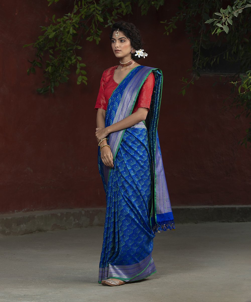 Purple_And_Green_Dual_Tone_Handloom_Embossed_Weave_Katan_Silk_Banarasi_Saree_WeaverStory_02