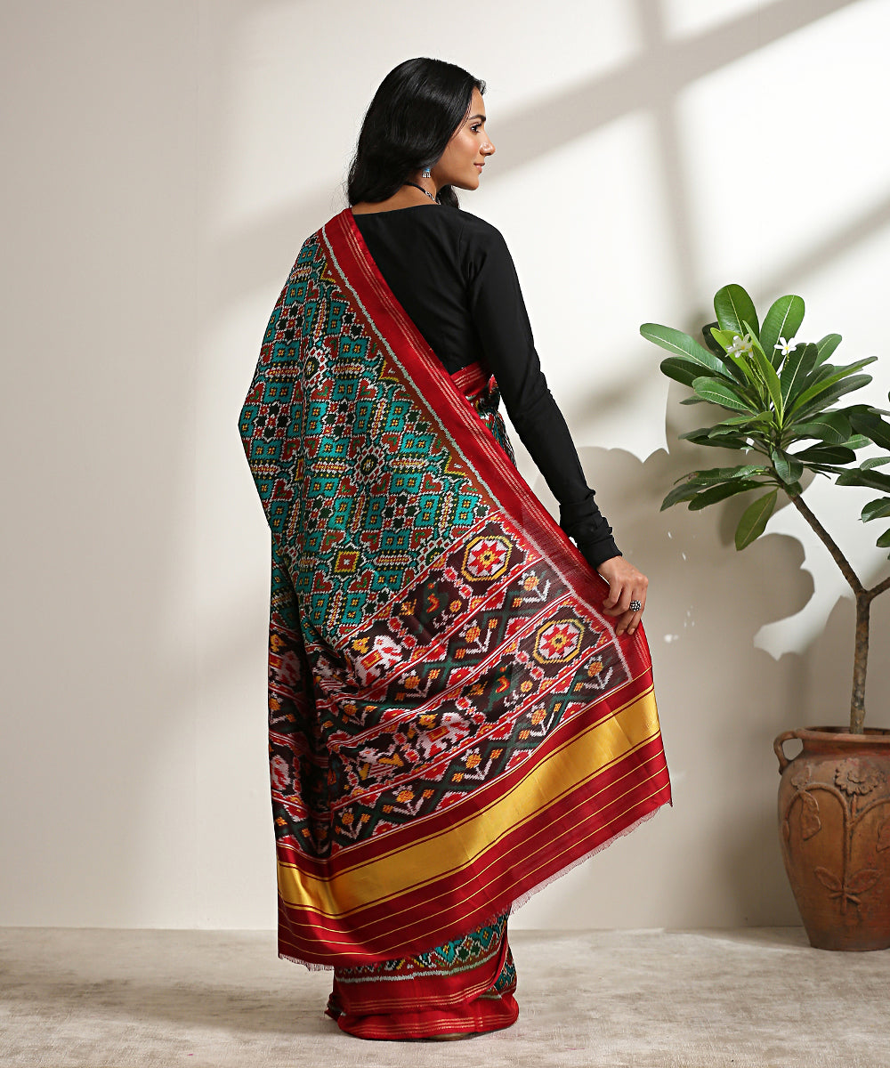 Emerald_Green_Handloom_Twill_Weave_Pure_Mulberry_Silk_Patola_Saree_WeaverStory_03