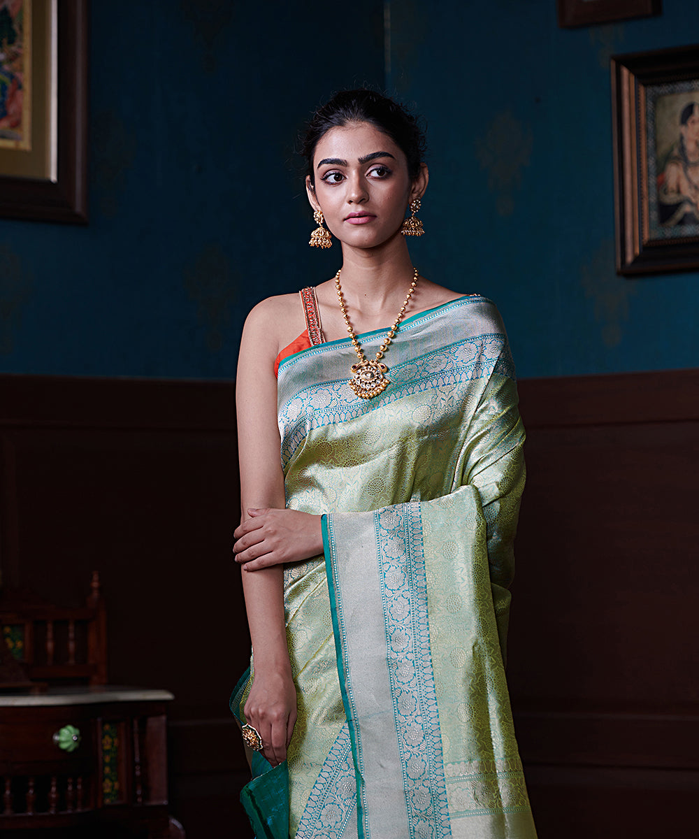 Handloom_Light_Green_Zari_Pure_Katan_Silk_Tanchoi_Banarasi_Saree_With_Aqua_Border_And_Blouse_WeaverStory_01