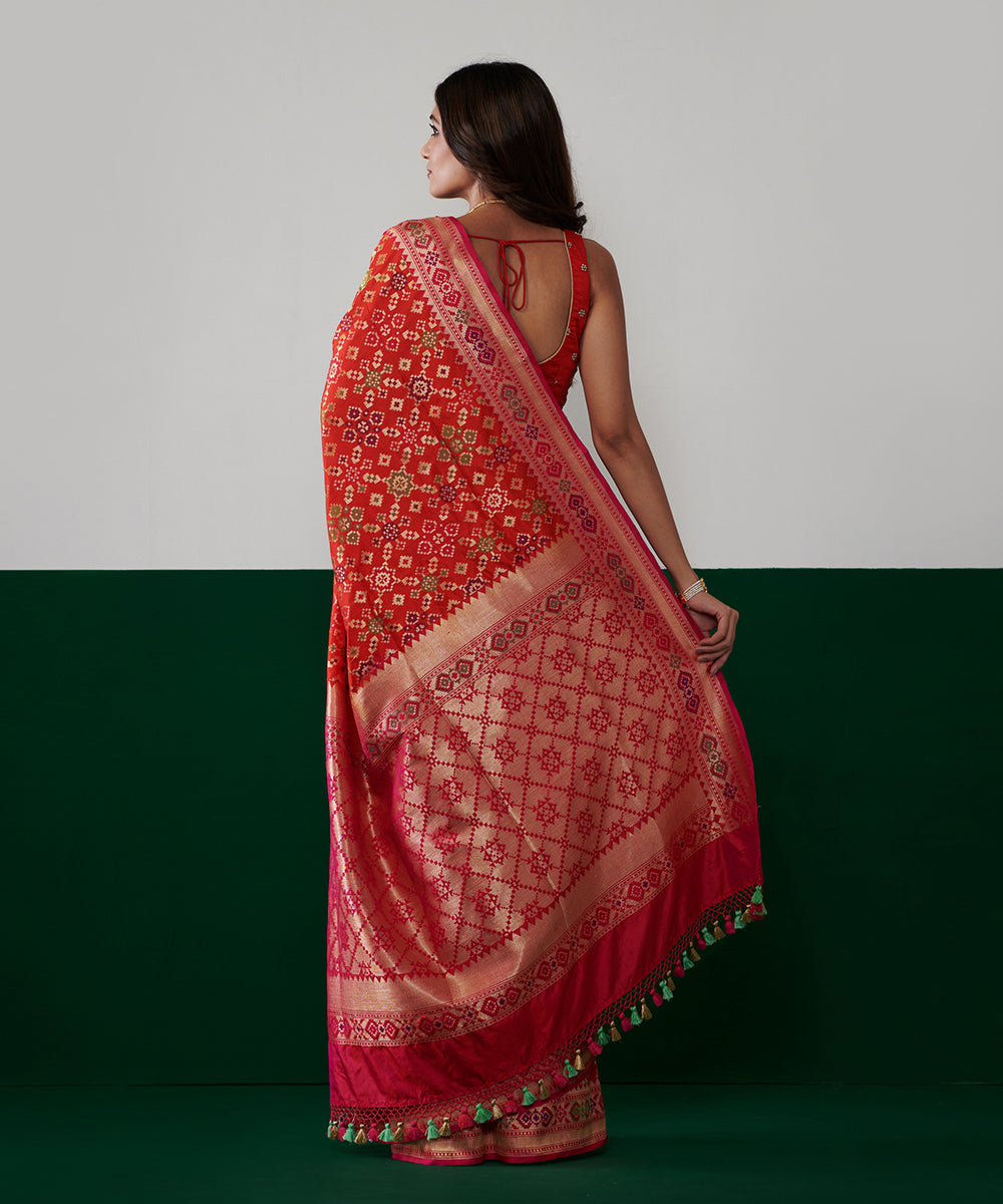 Orange_Handloom_Pure_Katan_Silk_Banarasi_Patola_Saree_With_Pink_Border_WeaverStory_03