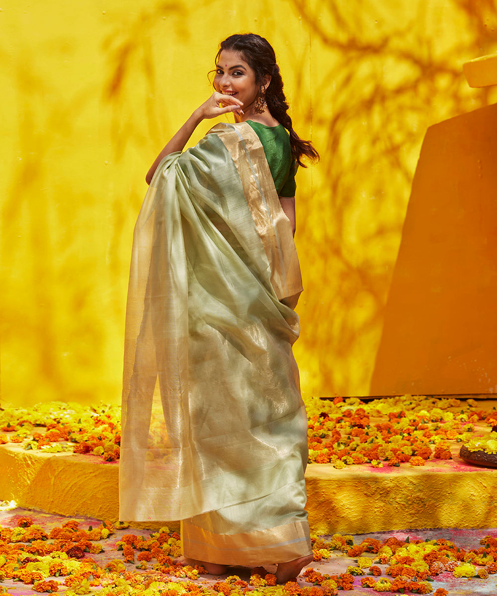 Pista_Green_Handloom_Plain_Cotton_Chanderi_Saree_With_Zari_Border_WeaverStory_03