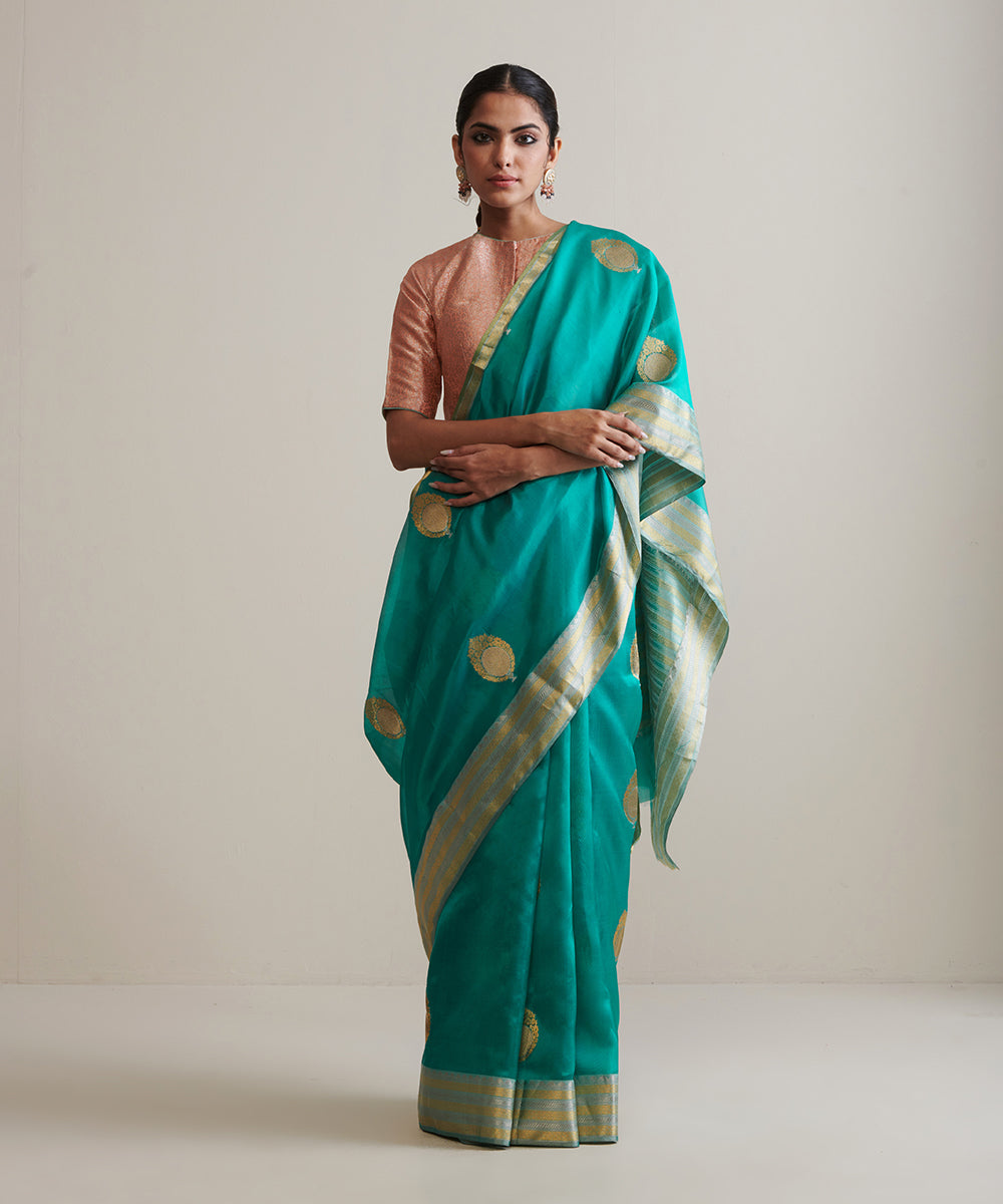 Teal_Handloom_Pure_Chanderi_Silk_Saree_With_Nakshi_Border_And_Anardana_Booti_WeaverStory_02