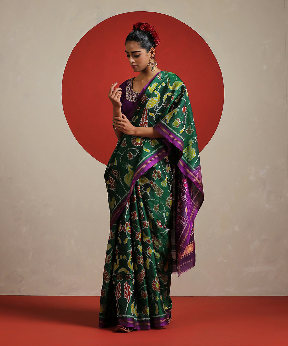 Handloom_Voilet_and_Green_Raw_Silk_Semi_Single_Ikat_Patola_Saree_WeaverStory_02