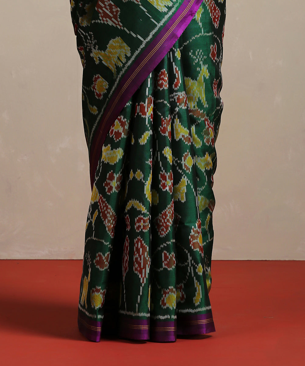 Handloom_Voilet_and_Green_Raw_Silk_Semi_Single_Ikat_Patola_Saree_WeaverStory_04