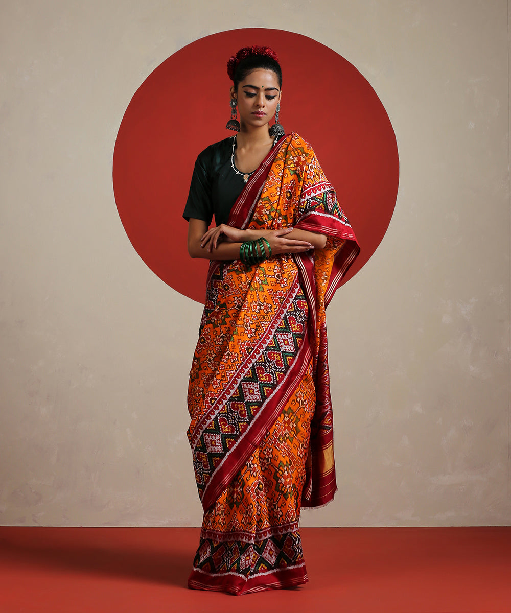 Handloom_Orange_Pure_Mulberry_Silk_Ikat_Patola_Saree_With_Twill_Weave_WeaverStory_02