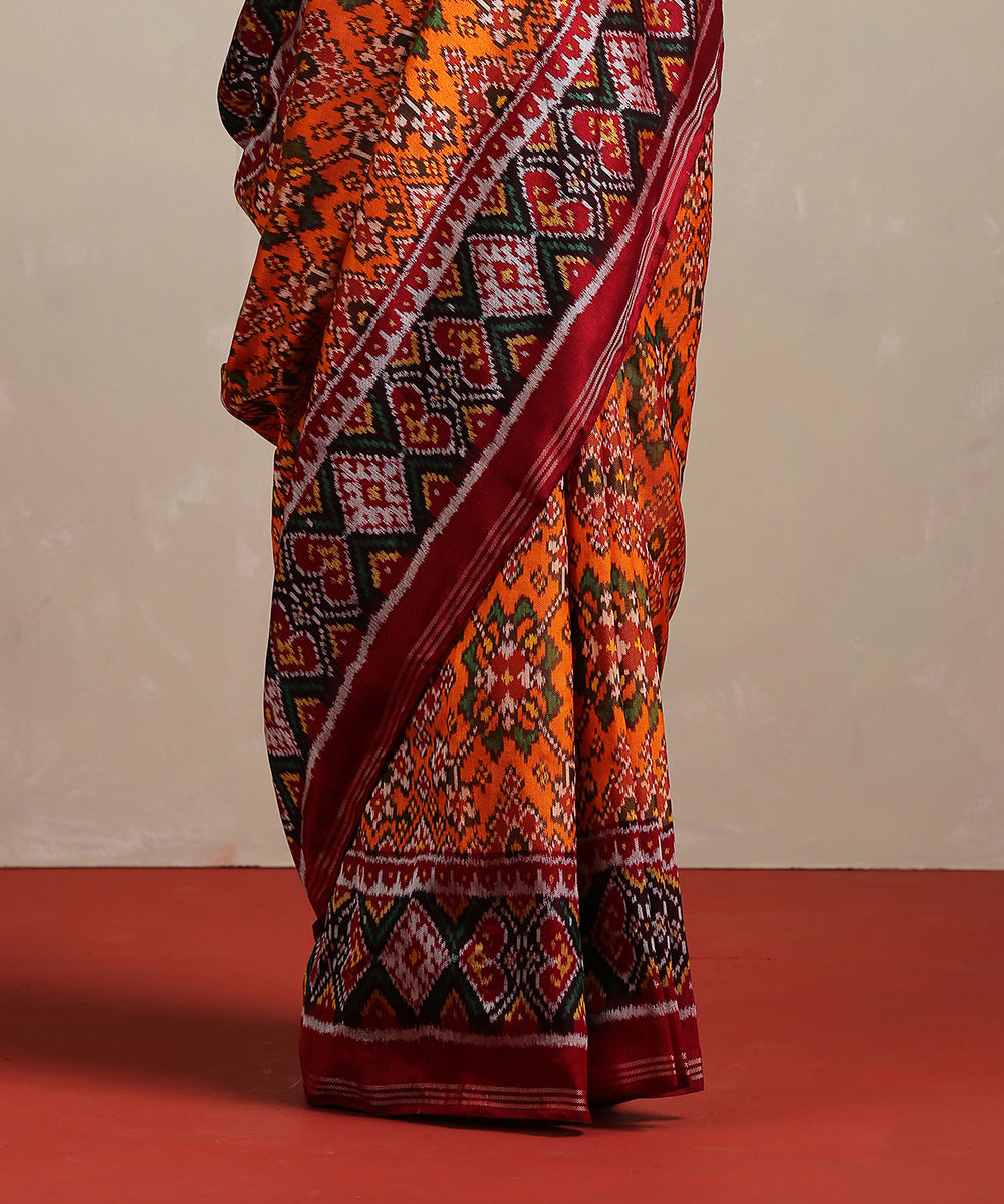 Handloom_Orange_Pure_Mulberry_Silk_Ikat_Patola_Saree_With_Twill_Weave_WeaverStory_04