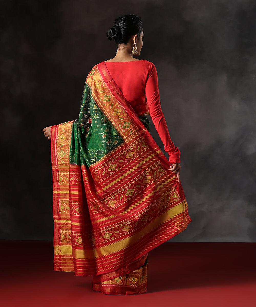 Green_Handloom_Pure_Mulberry_Silk_Single_Ikat_Patola_Saree_With_Red_Tissue_Border_WeaverStory_03