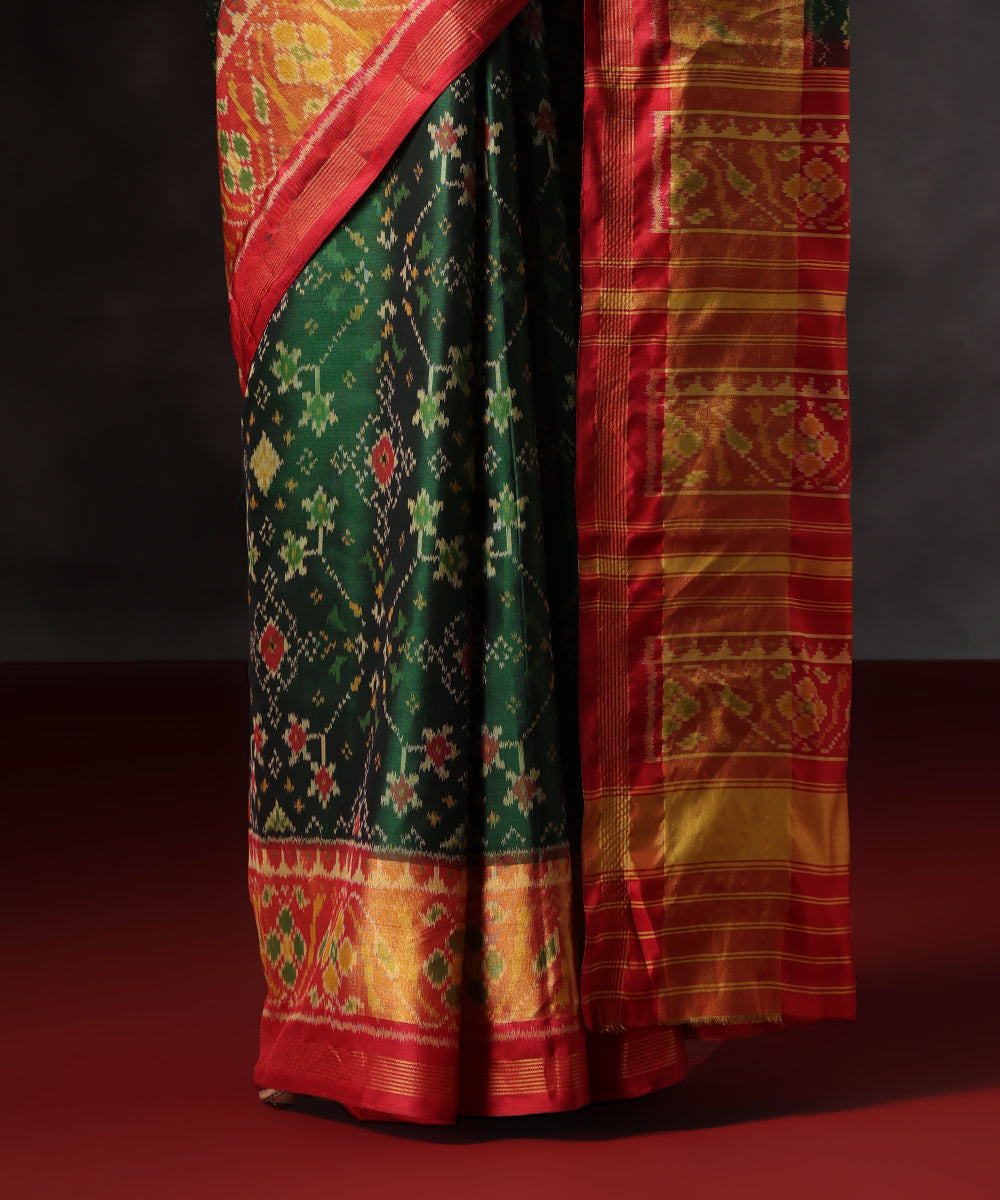 Green_Handloom_Pure_Mulberry_Silk_Single_Ikat_Patola_Saree_With_Red_Tissue_Border_WeaverStory_04