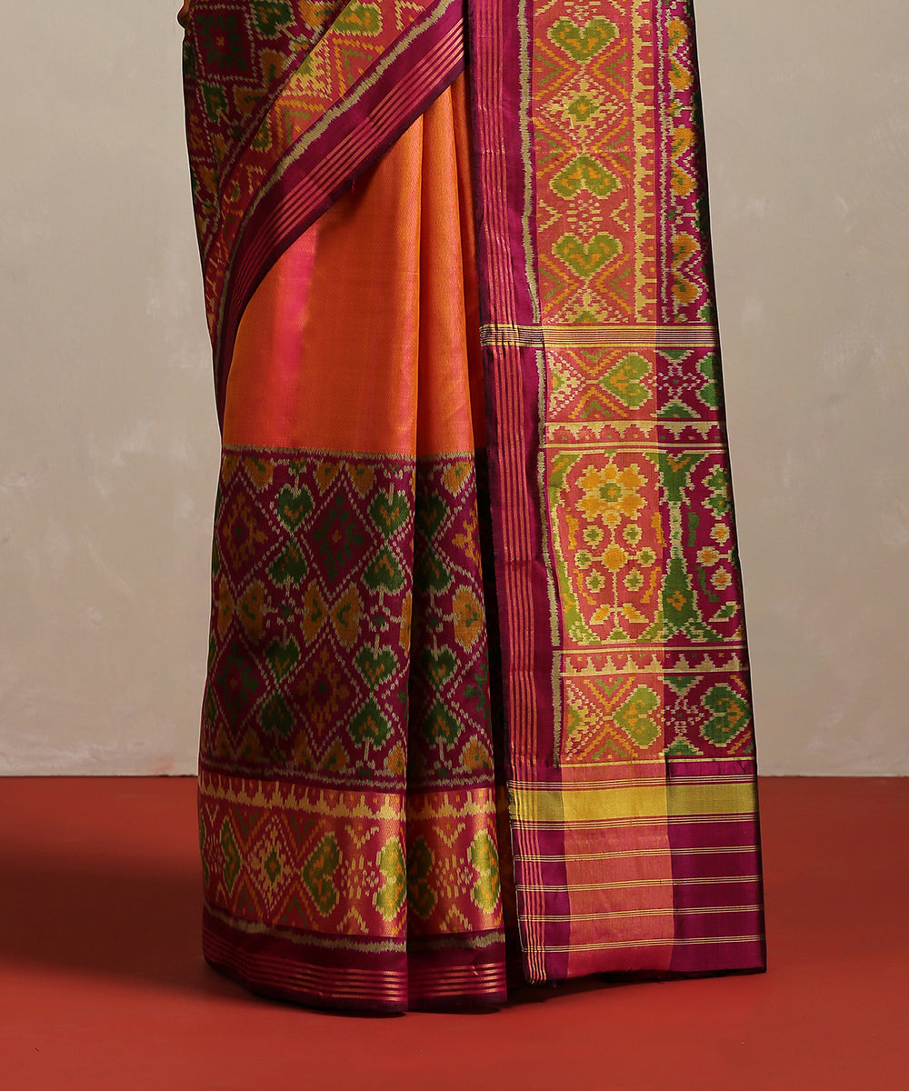 Peach_Handloom_Pure_Mulberry_Silk_Ikat_Patola_Saree_With_Purple_Tissue_Border_WeaverStory_04