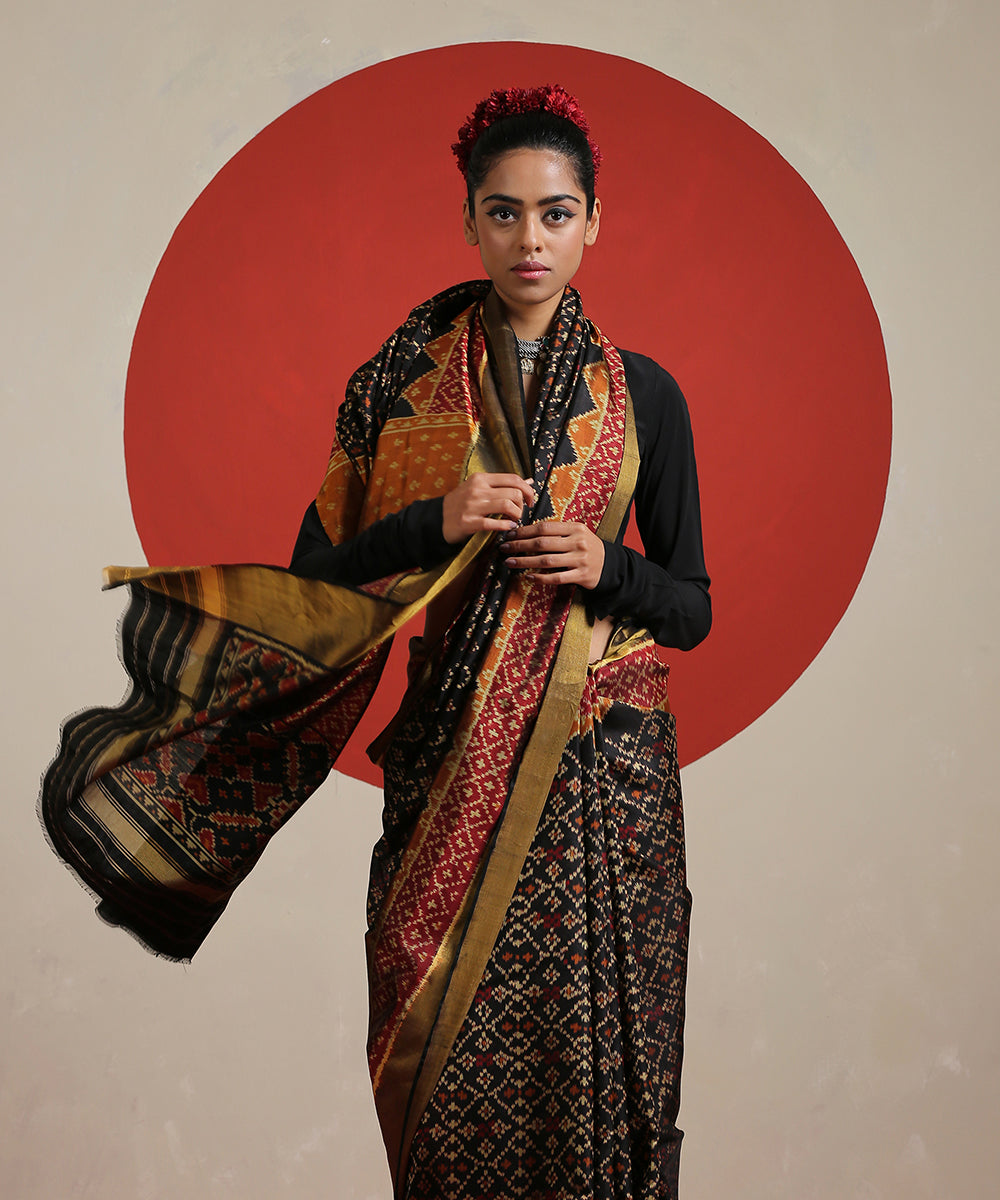 Black_Handloom_Pure_Mulberry_Silk_Single_Ikat_Patola_With_Tissue_Border_Saree_WeaverStory_01