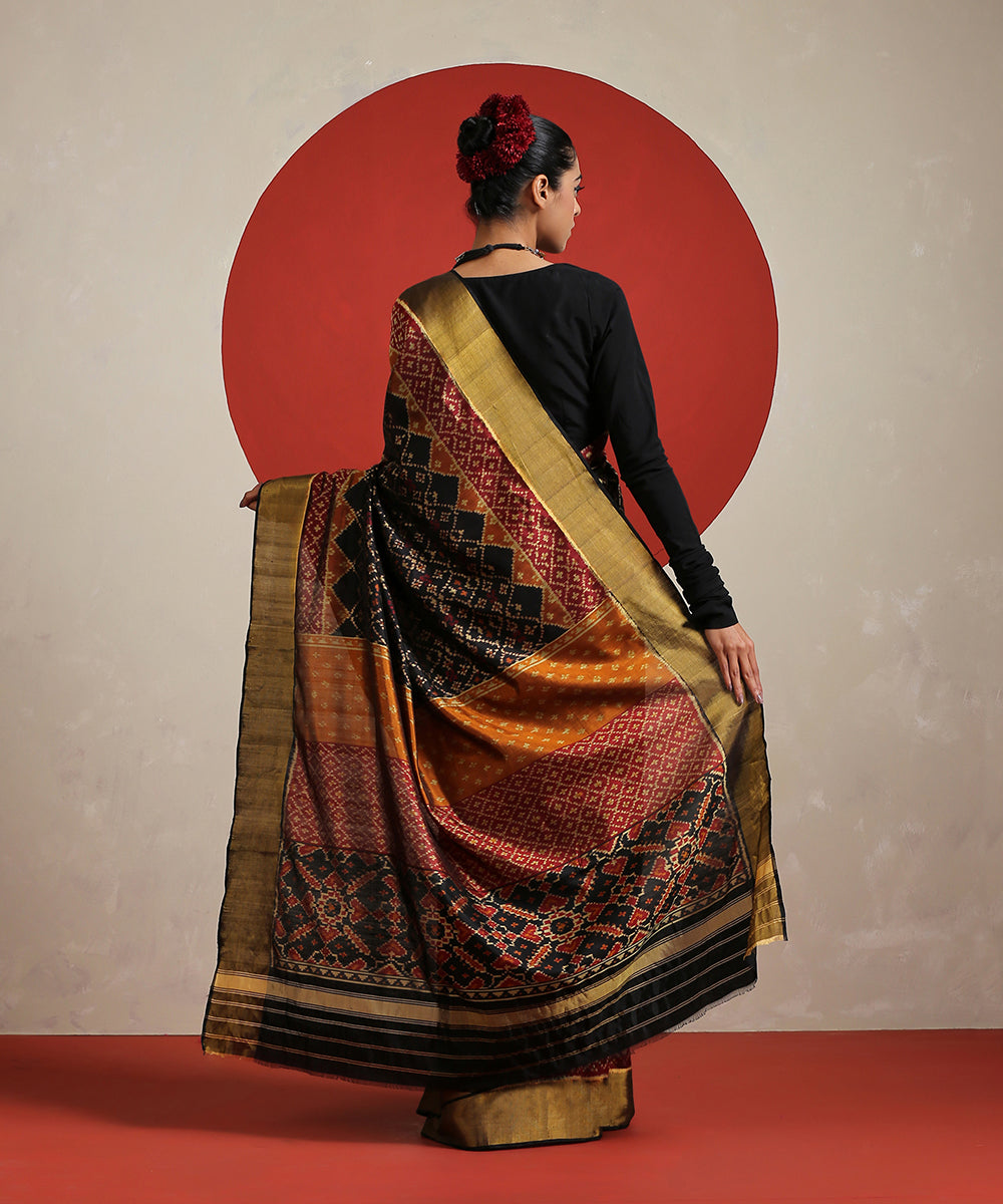 Black_Handloom_Pure_Mulberry_Silk_Single_Ikat_Patola_With_Tissue_Border_Saree_WeaverStory_03