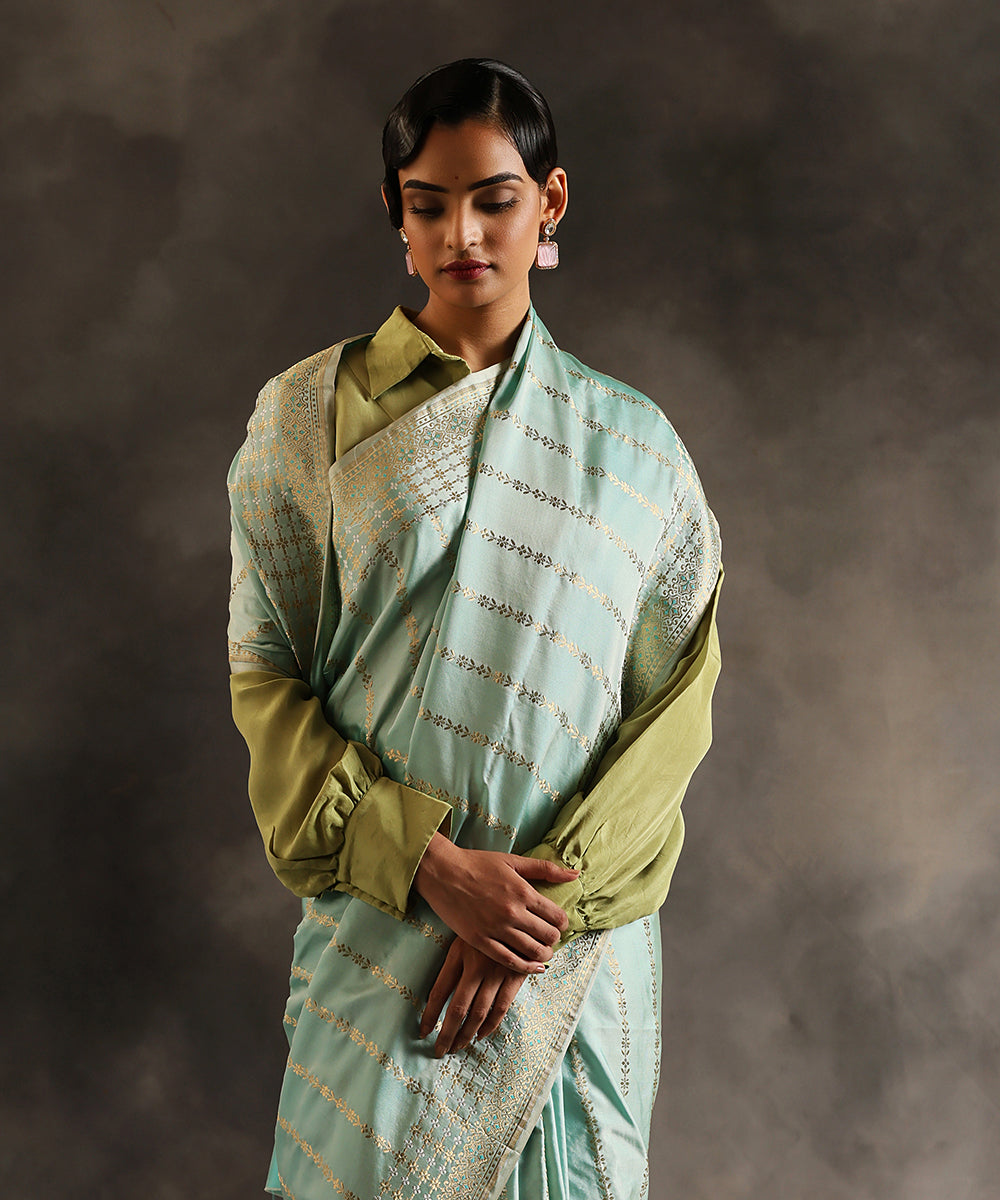 Powder_Blue_Handloom_Mushroo_Silk_Banarasi_Saree_With_Gold_Zari_Vertical_Stripes_WeaverStory_01