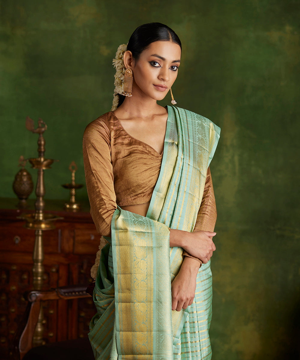 Handloom_Mint_Green_Pure_Silk_Kanjivaram_Saree_With_Gold_Zari_Checks_And_Shikargah_Border_WeaverStory_01