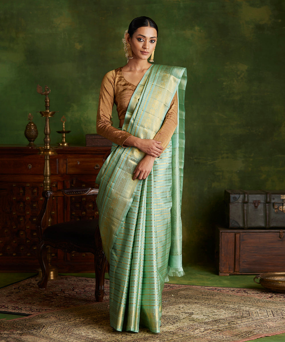 Handloom_Mint_Green_Pure_Silk_Kanjivaram_Saree_With_Gold_Zari_Checks_And_Shikargah_Border_WeaverStory_02