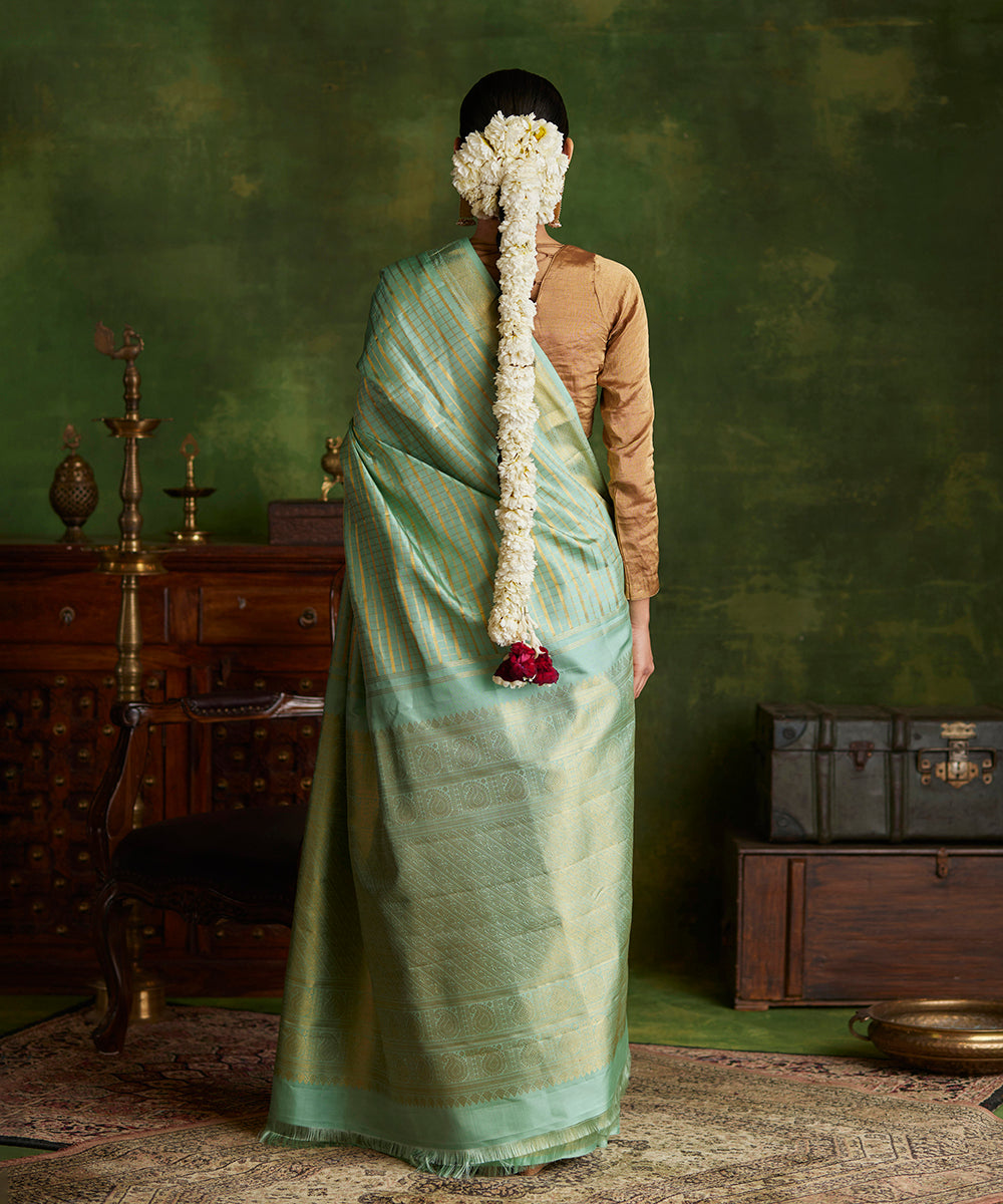 Handloom_Mint_Green_Pure_Silk_Kanjivaram_Saree_With_Gold_Zari_Checks_And_Shikargah_Border_WeaverStory_03