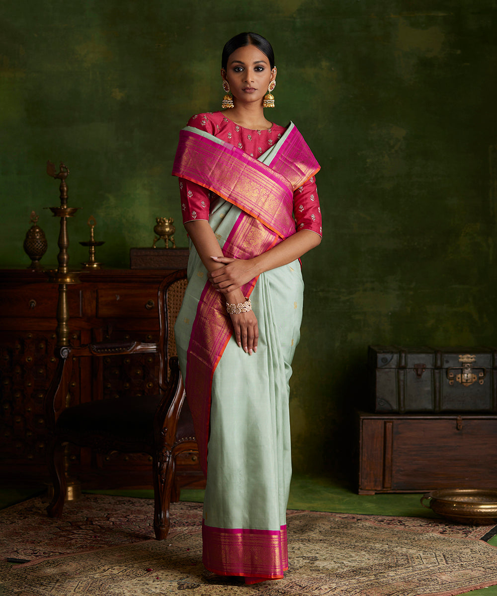 Handloom_Mint_Green_Pure_Silk_Kanjivaram_Saree_With_Korvai_Rani_Pink_Shikargah_Border_WeaverStory_02