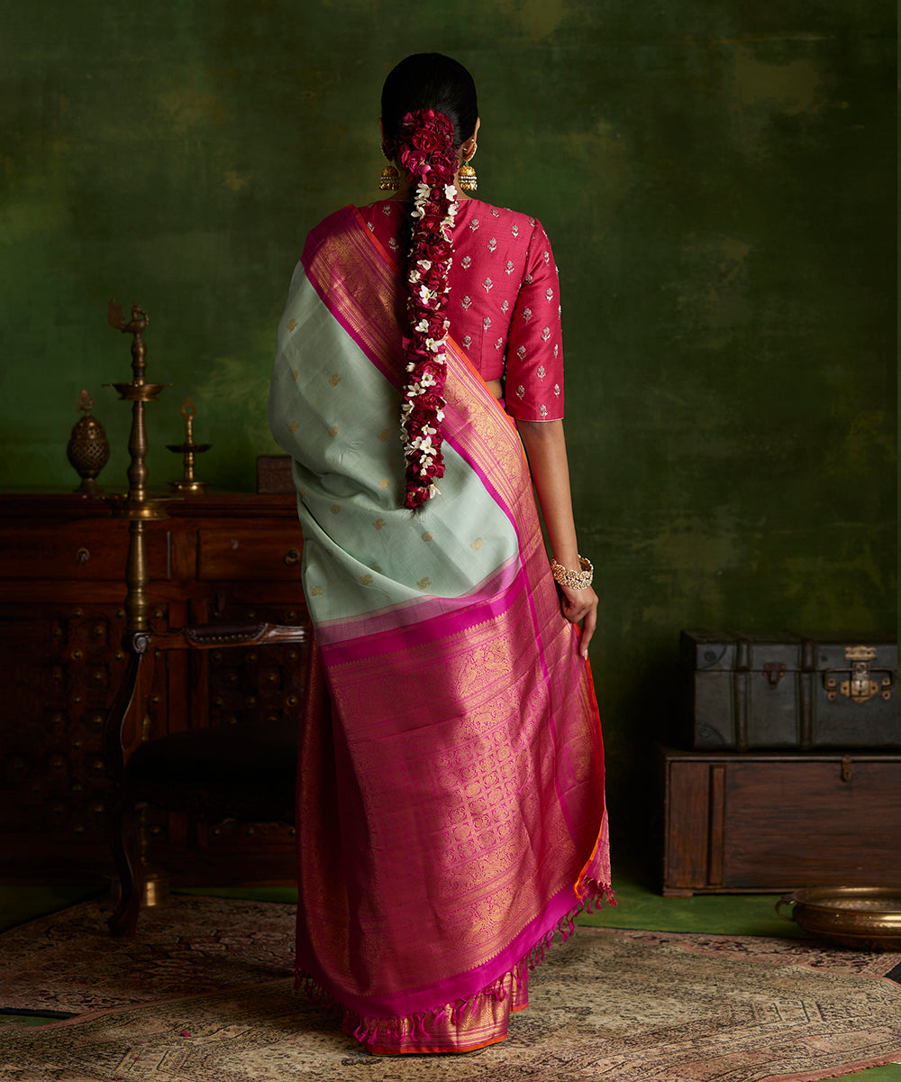 Handloom_Mint_Green_Pure_Silk_Kanjivaram_Saree_With_Korvai_Rani_Pink_Shikargah_Border_WeaverStory_03