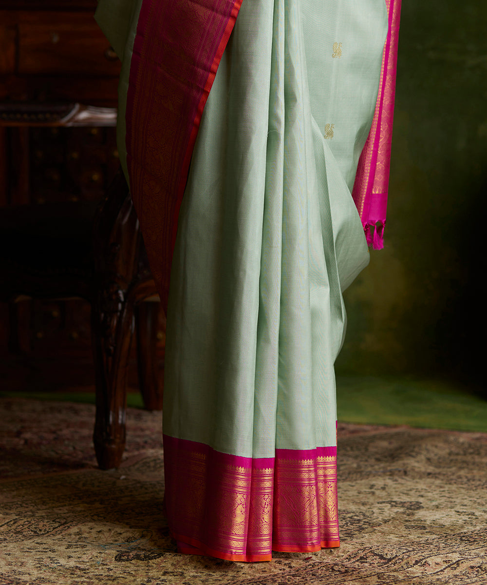 Handloom_Mint_Green_Pure_Silk_Kanjivaram_Saree_With_Korvai_Rani_Pink_Shikargah_Border_WeaverStory_04