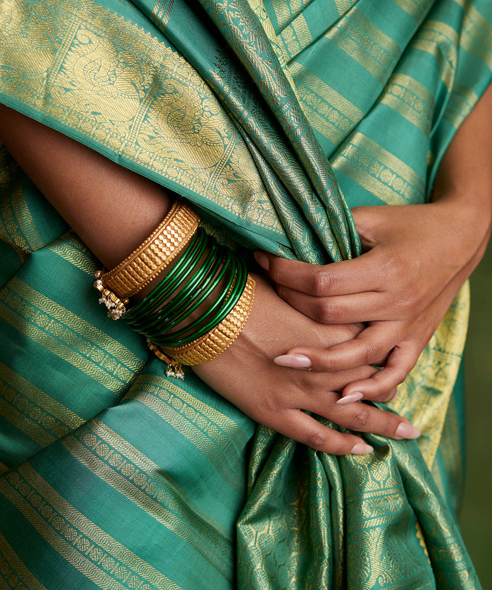 Sage_Green_Handloom_Pure_Zari_Kanjivaram_Saree_With_Vertical_Zari_Rudraksh_Stripes_WeaverStory_05