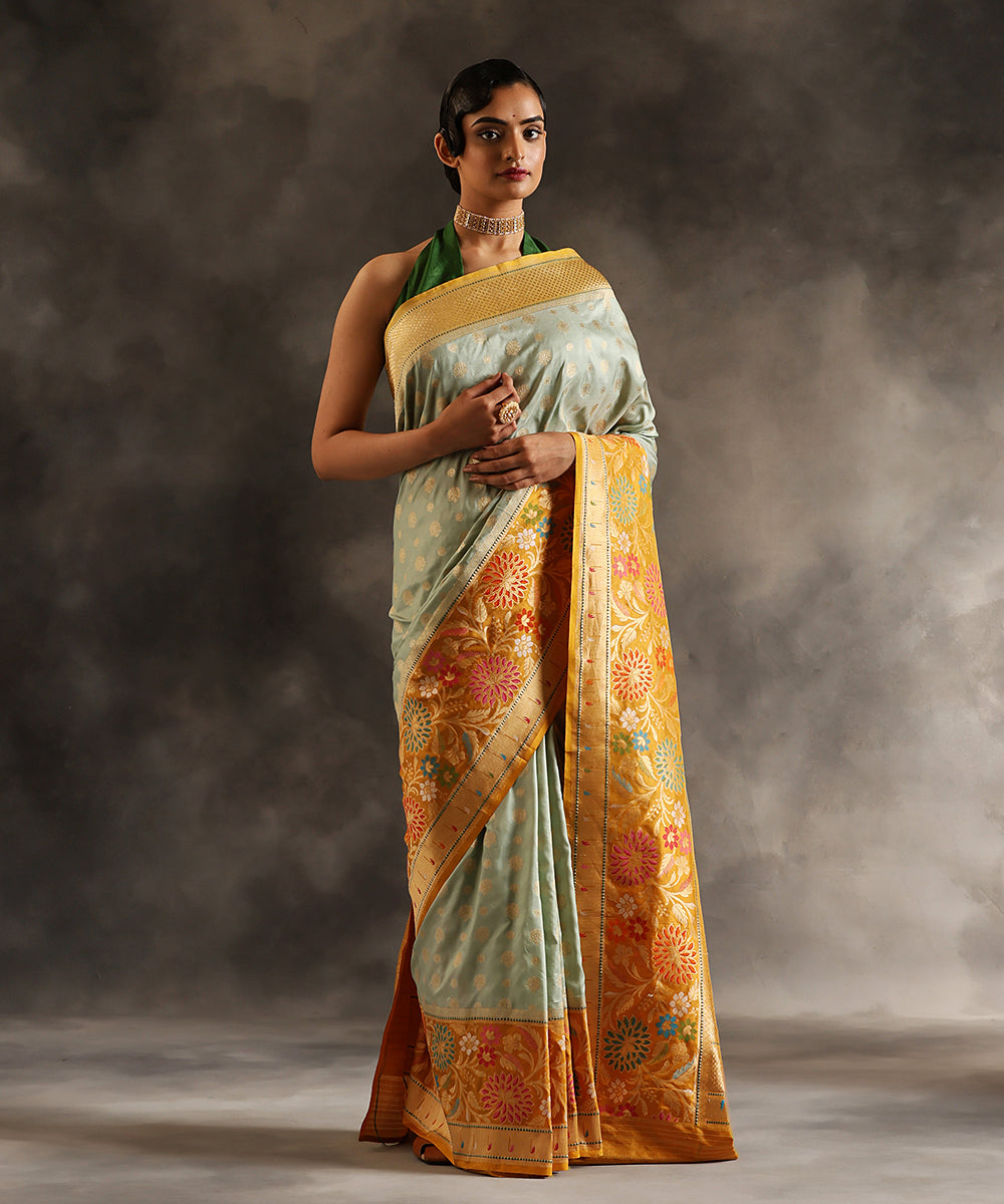 Handloom_Light_Blue_Pure_Katan_Silk_Banarasi_Saree_With_Zari_Booti_And_Yellow_Kadhiyal_Border_WeaverStory_02