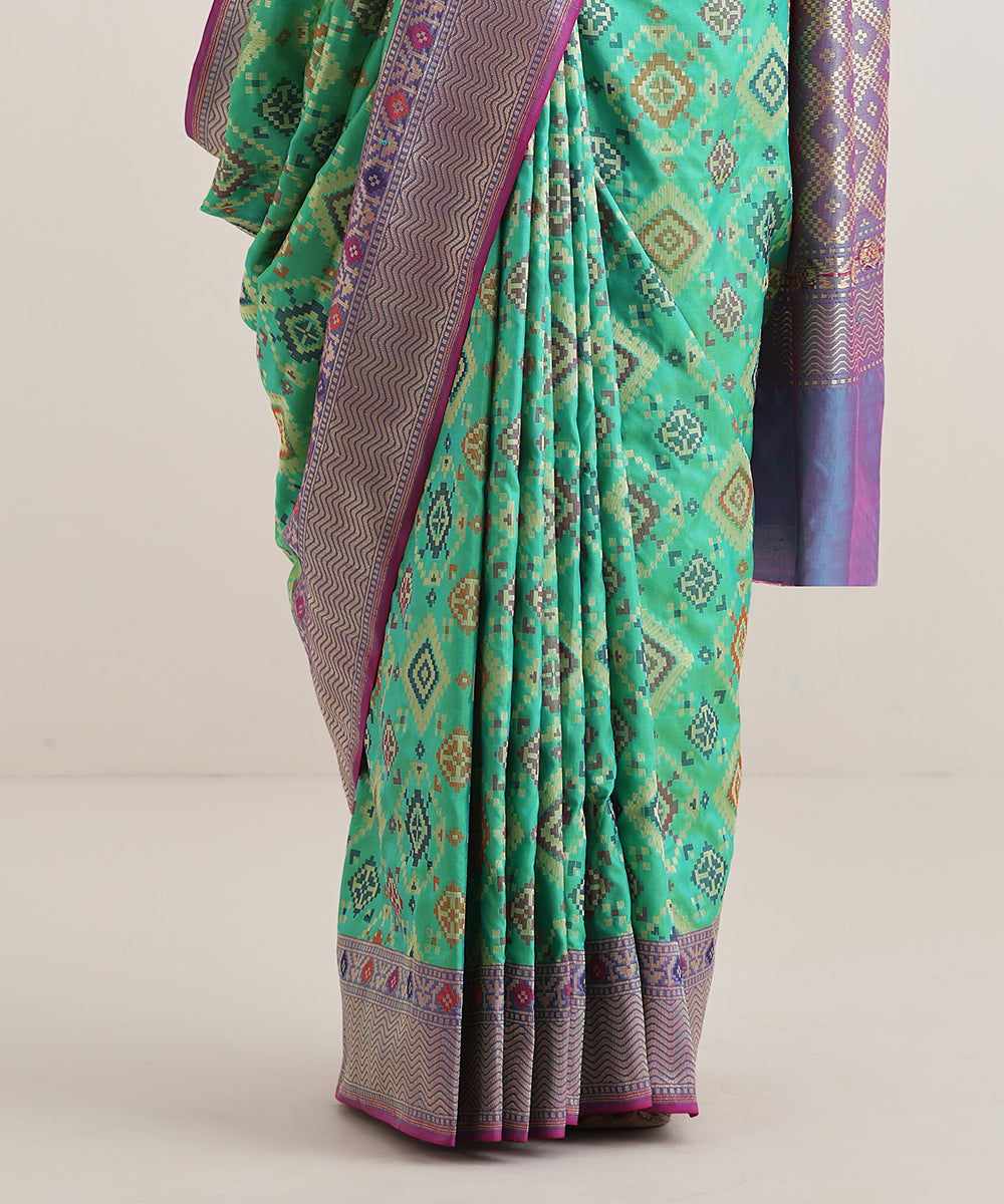 Teal_Green_Handloom_Meenakari_Banarasi_Patola_Saree_With_Purple_Border_WeaverStory_04