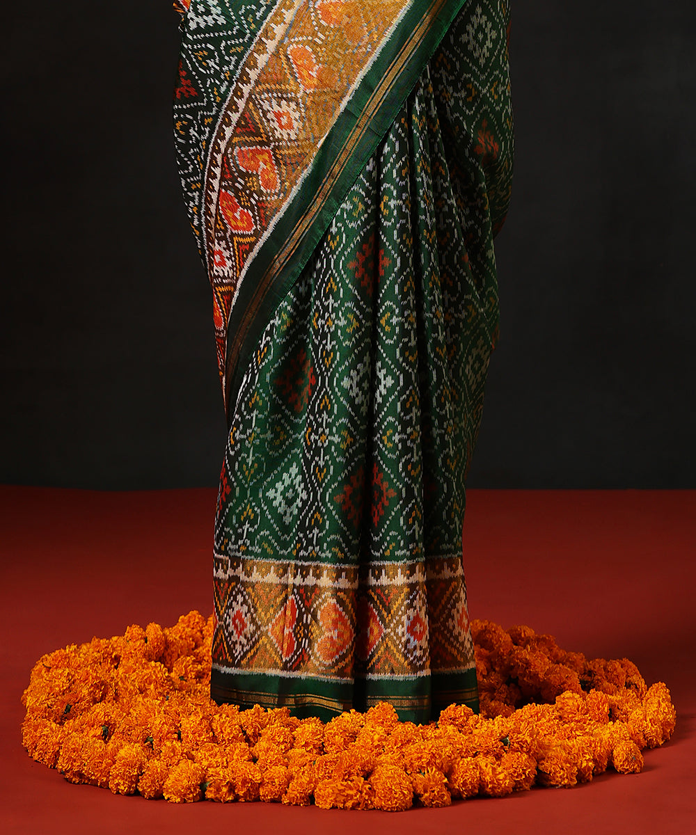 Dark_Green_Handloom_Pure_Mulberry_Silk_Single_Ikat_Patola_Saree_With_Mustard_TissueBorder_WeaverStory_04