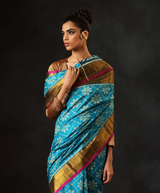 Aqua Blue Handloom Raw Silk Single Ikat Patola Saree With Gold Tissue Border