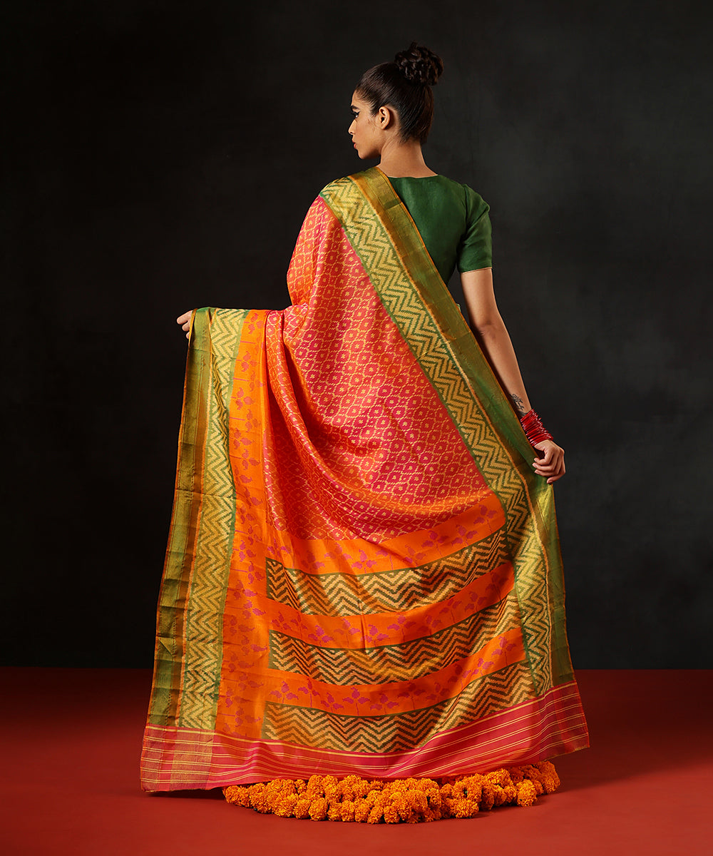 HandloomPink_And_Orange_Double_Shade_Pure_Mulberry_Silk_Single_Ikat_Patola_Saree_WithLeaf_Green_Tissue_Border_WeaverStory_03