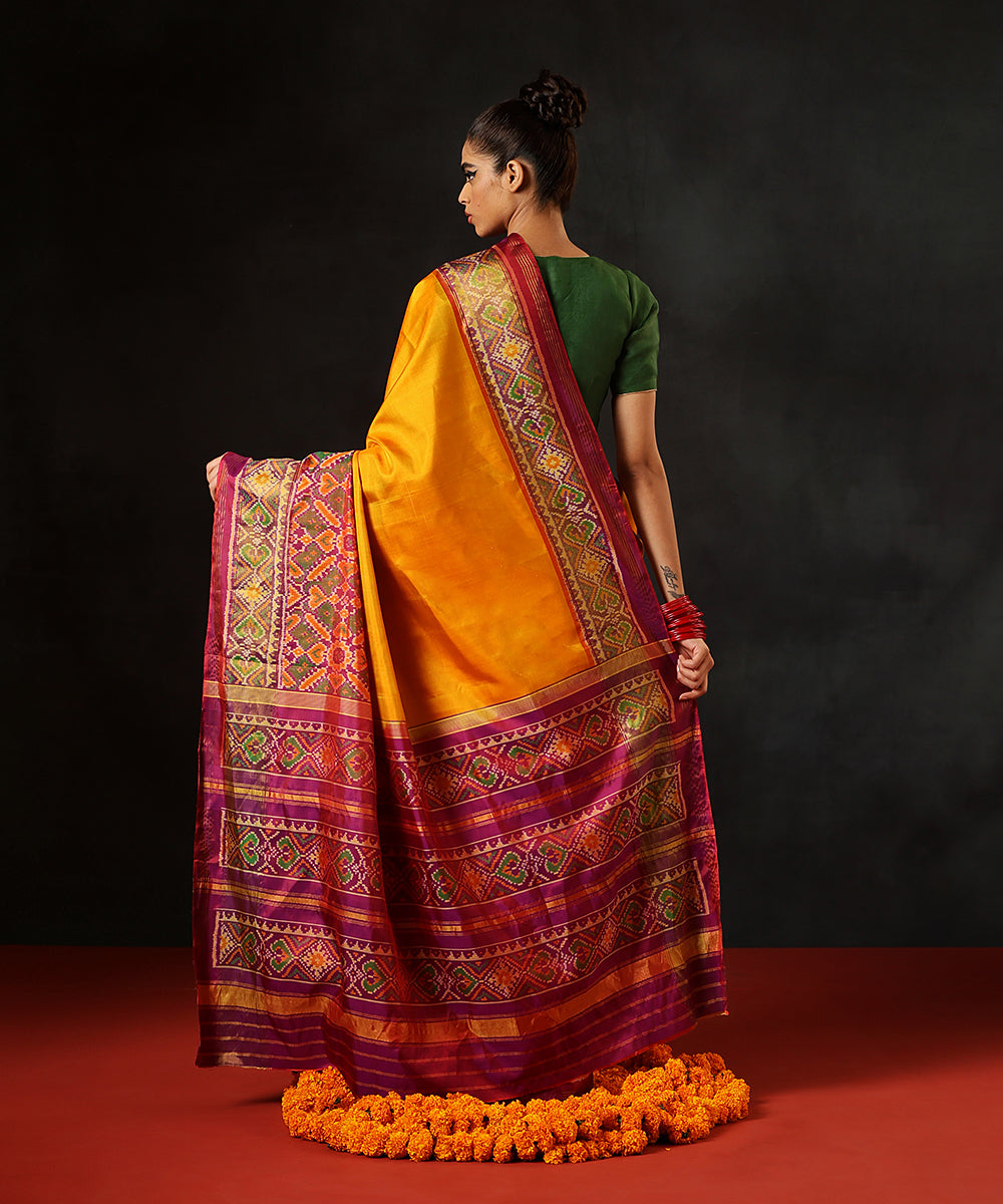 Mustard_Handloom_Pure_Mulberry_Silk_Single_Ikat_Patola_Saree_With_PurpleTissue_Border_And_Pallu_WeaverStory_03