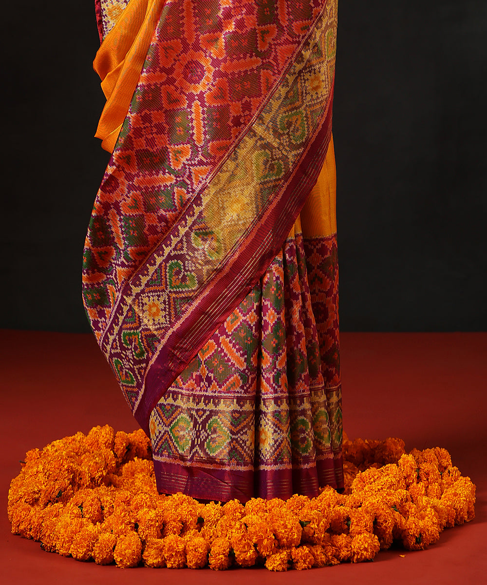 Mustard_Handloom_Pure_Mulberry_Silk_Single_Ikat_Patola_Saree_With_PurpleTissue_Border_And_Pallu_WeaverStory_04