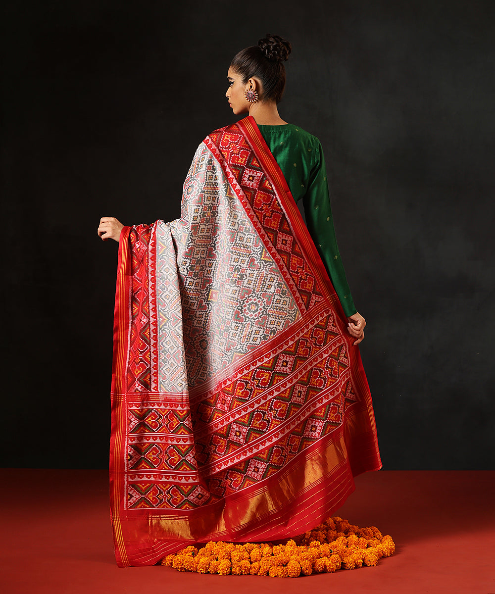 Handloom_White_Pure_MulberrySilk_Single_Ikat_Patola_Saree_With_Maroon_Border_WeaverStory_03