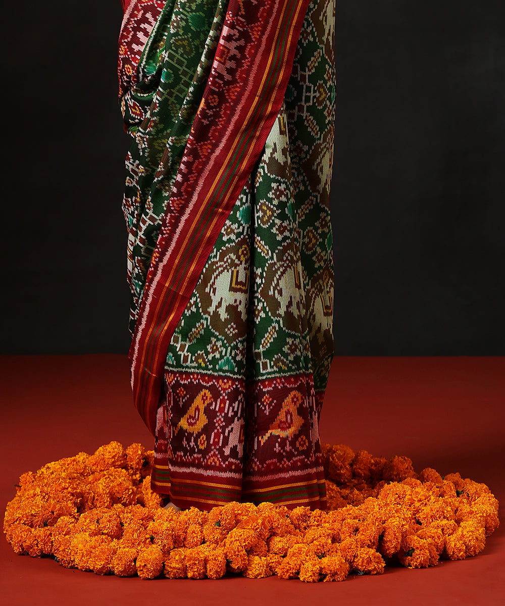 Green_HandloomPure_Mulberry_Silk_Single_Ikat_Patola_SareeWith_Maroon_Border_WeaverStory_04