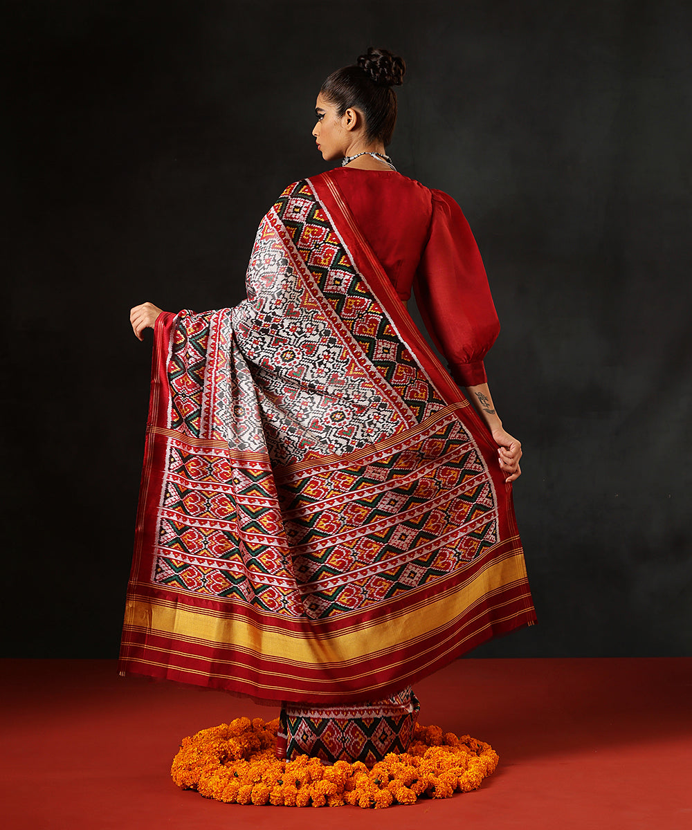 Handloom_White_Pure_MulberrySilk_Single_Ikat_Patola_Saree_With_Twill_Weave_And_Maroon_Border_WeaverStory_03
