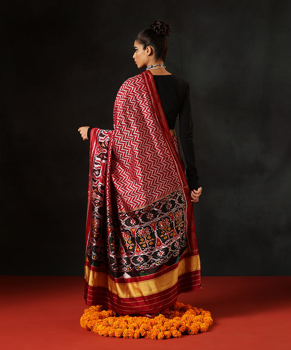 Maroon_Handloom_Pure_Mulberry_Silk_Single_Ikat_Patola_Saree_With_Dark_Maroon_Elephant_Border_WeaverStory_03