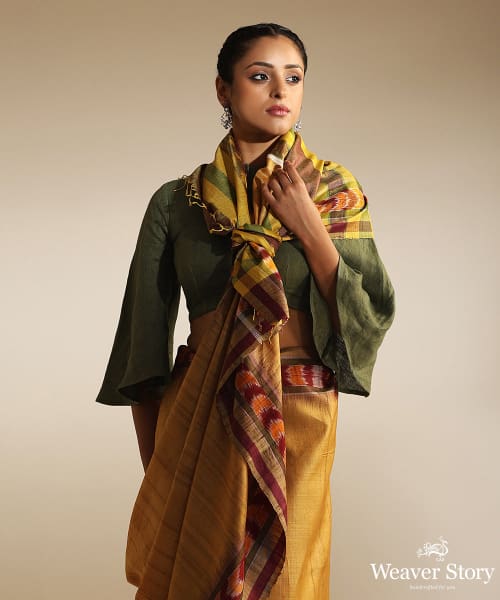 Handloom_Mustard_And_Green_Tussar_Silk_Single_Ikat_Saree_With_Dhanapatra_Design_WeaverStory_01