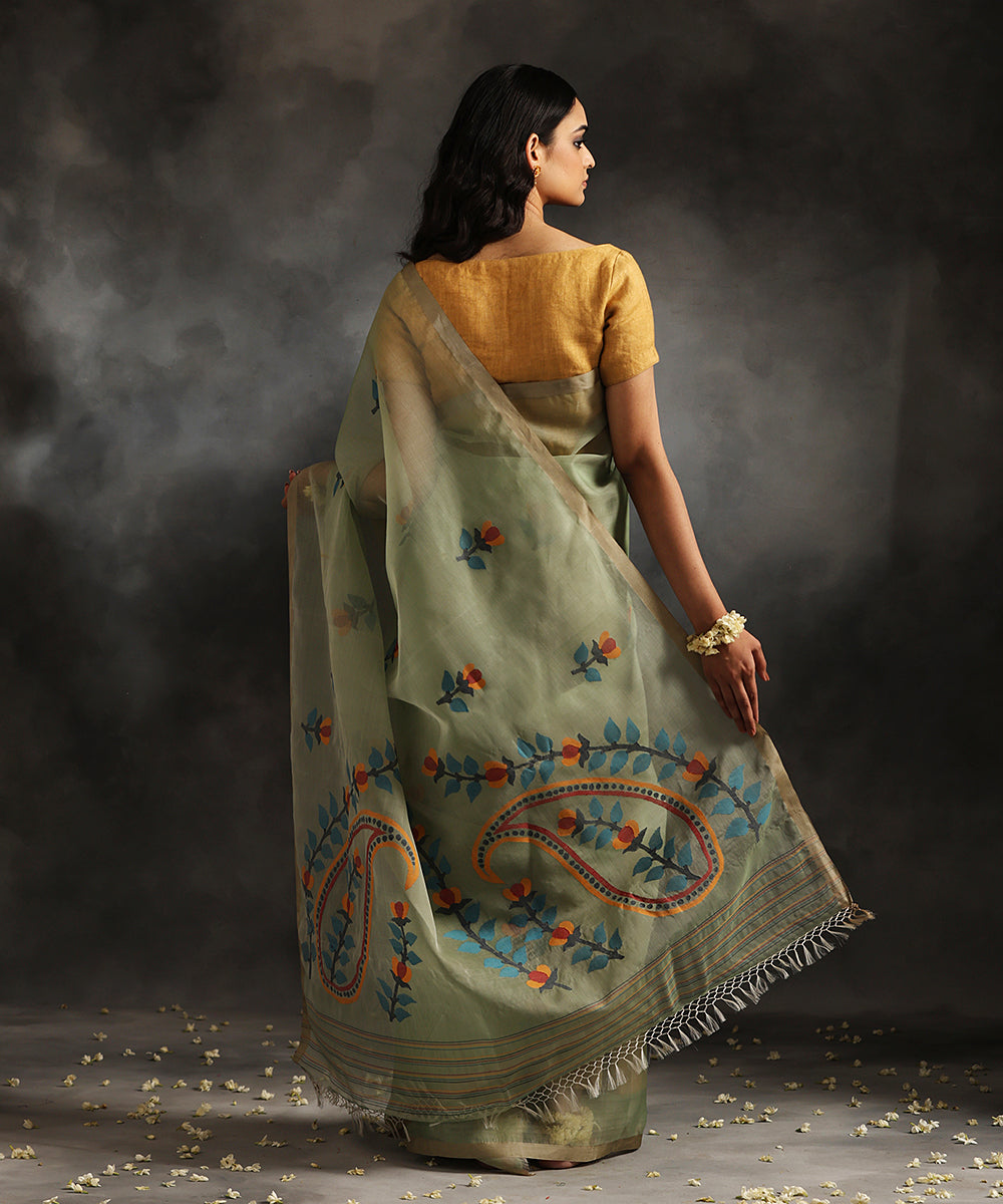 Pistachio_Green_Handloom_Pure_Kora_Silk_Muslin_Dhakai_Jamdani_Saree_With_Blue_Leaves_WeaverStory_03