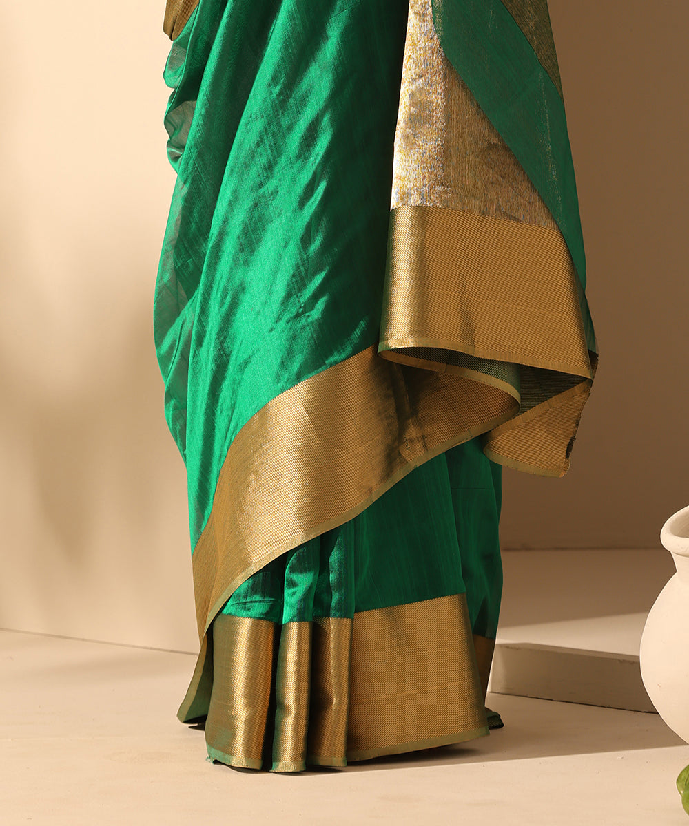 Dark_Green_Handloom_Pure_Plain_Chanderi_Saree_With_6_Inches_Border_WeaverStory_04