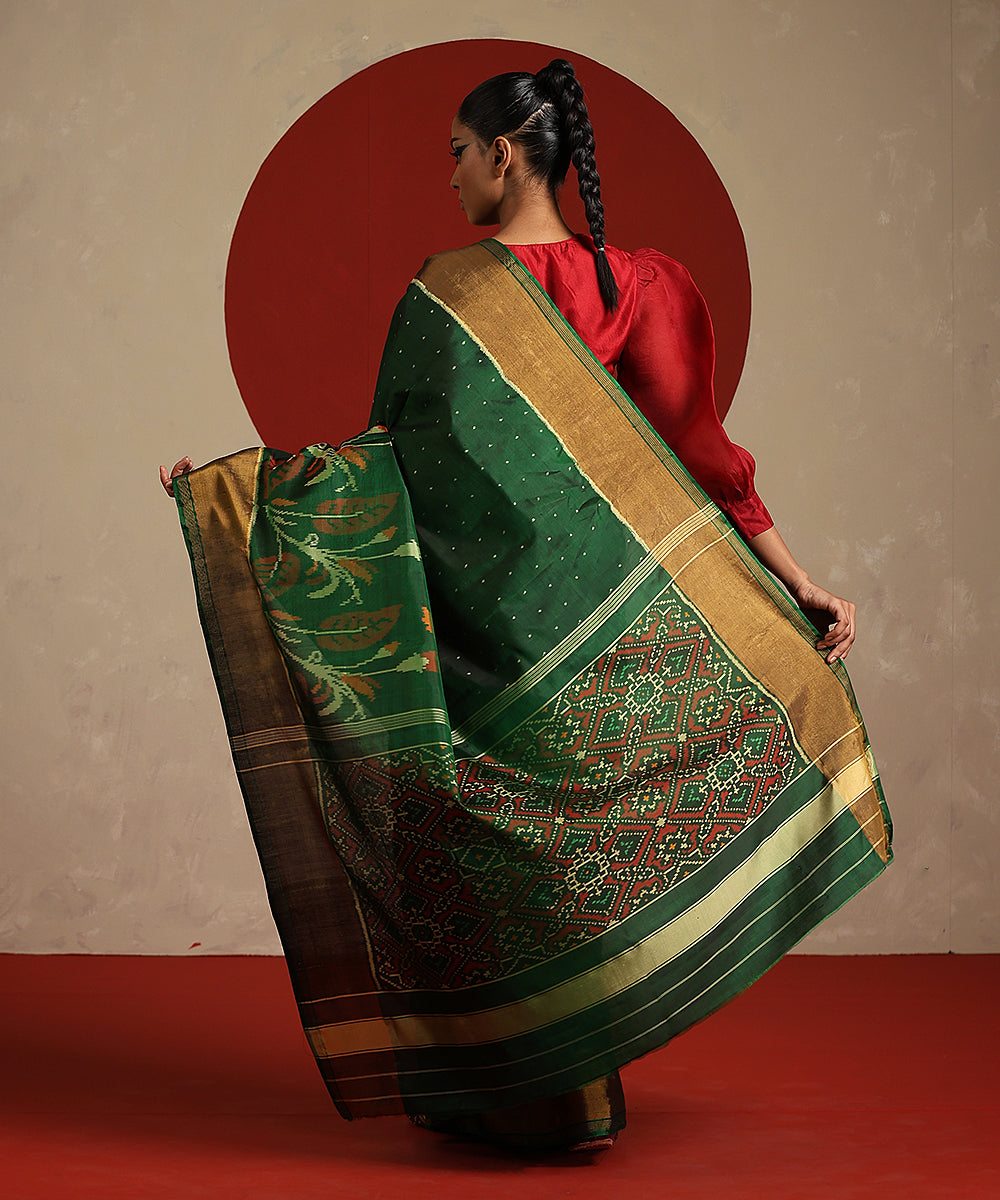 Handloom_Dark_Green_And_Mustard_Pure_Mulberry_Silk_Ikat_Patola_Saree_WeaverStory_03