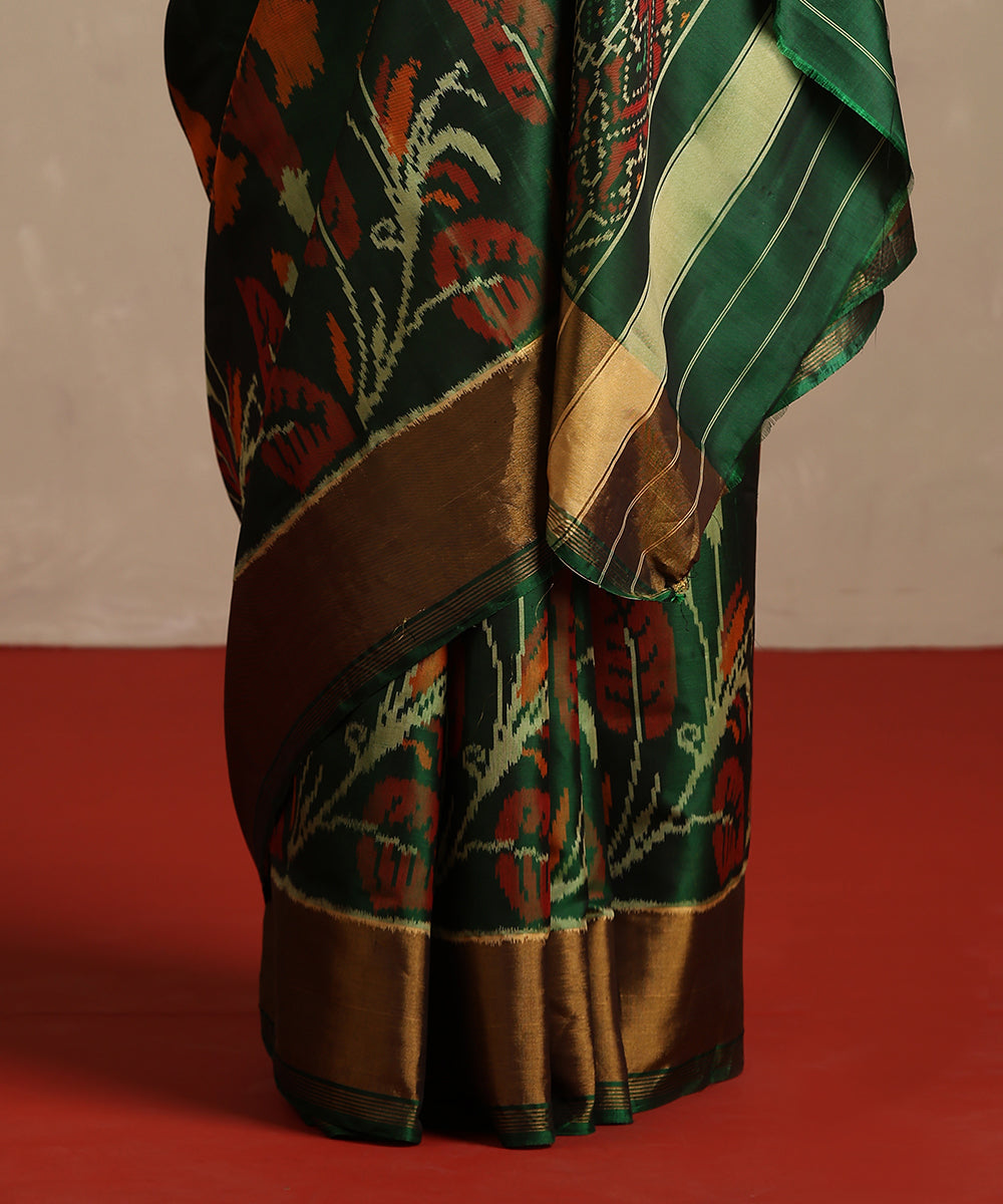 Handloom_Dark_Green_And_Mustard_Pure_Mulberry_Silk_Ikat_Patola_Saree_WeaverStory_04