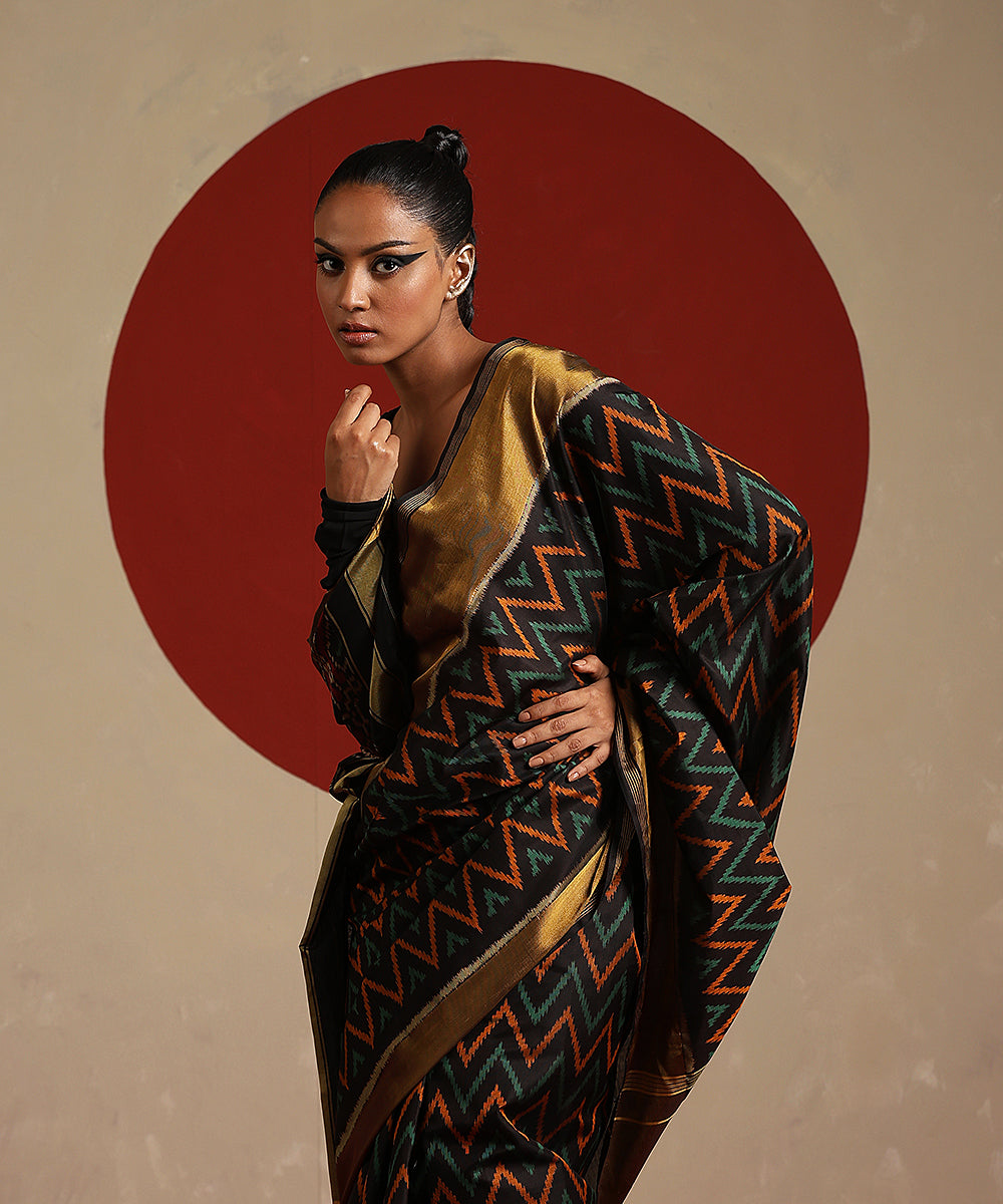 Black_And_Maroon_Handloom_Pure_Mulberry_Silk_Ikat_Patola_Saree_With_Tissue_Border_WeaverStory_01