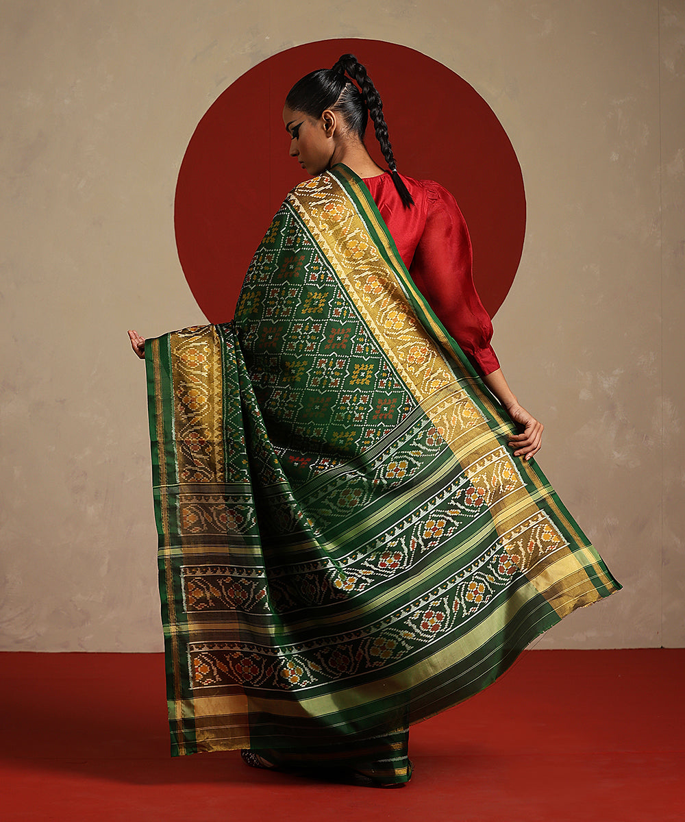 Handloom_Green_And_Mustard_Pure_Mulberry_Silk_Ikat_Patola_Saree_WeaverStory_03
