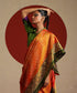 Handloom_Orange_And_Green_Double_Shade_Pure_Mulberry_Silk_Ikat_Patola_Saree_WeaverStory_01