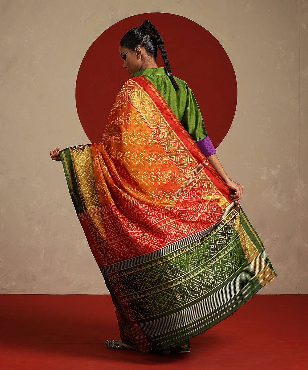 Handloom_Orange_And_Green_Double_Shade_Pure_Mulberry_Silk_Ikat_Patola_Saree_WeaverStory_03