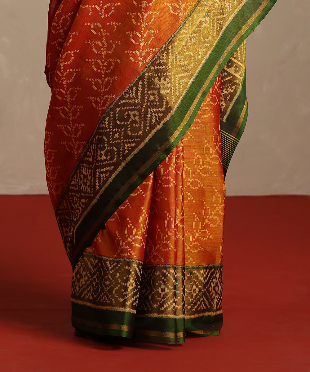 Handloom_Orange_And_Green_Double_Shade_Pure_Mulberry_Silk_Ikat_Patola_Saree_WeaverStory_04