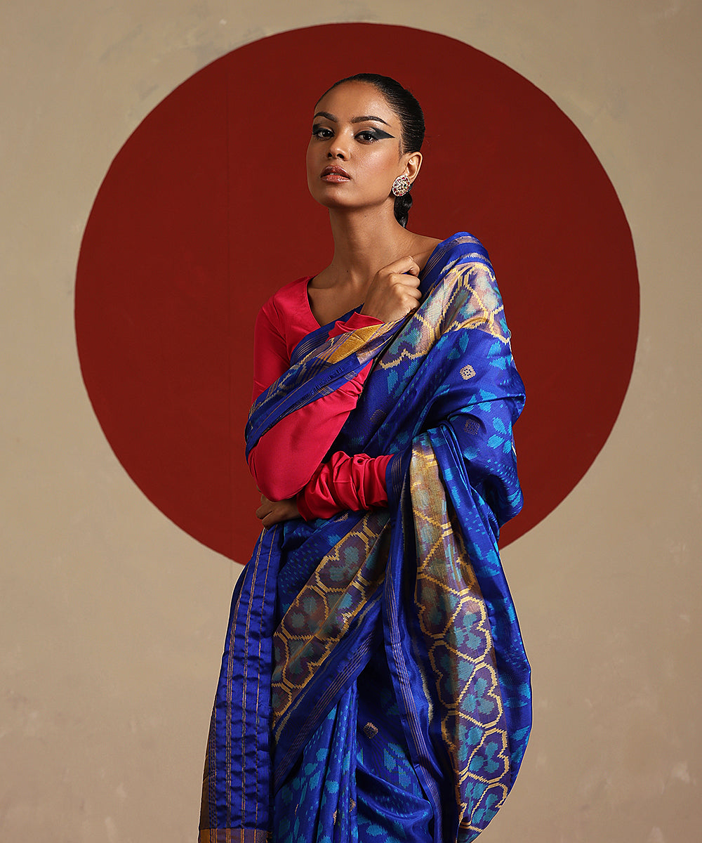 Electric_Blue_And_Mustard_Double_Shade_Handloom_Pure_Mulberry_Silk_Ikat_Patola_Saree_WeaverStory_01